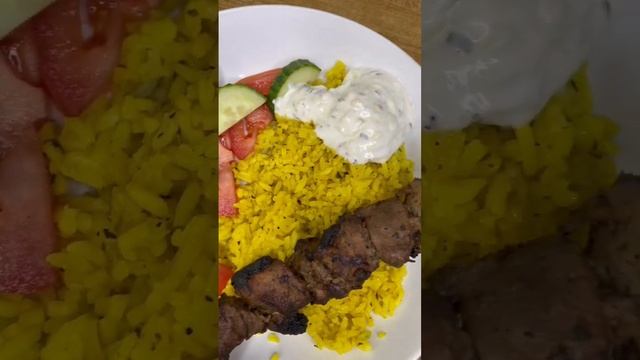 Pork Souvlaki, Greek rice and Tzatziki! Subscribe for the recipe!