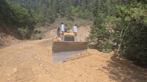 Строительство, срезаем горный склон продолжение