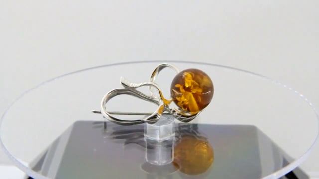 Серебряная брошь с янтарем "Бантик"