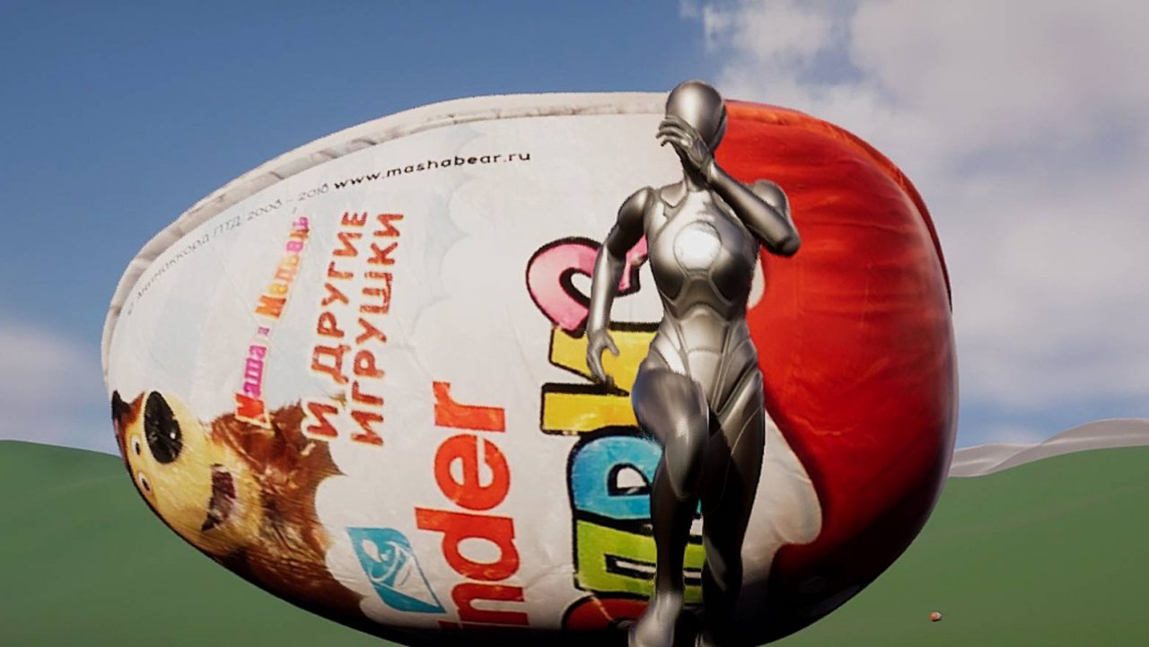 Человек пинает большой киндер.