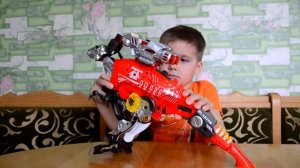 Динобот-трансформер Тираннозавр. Dinobots Robot Blaster T-Rex.