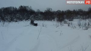 Мототолкач Ураган Тайга после 2-х недельного снегопада. Рыхлый снег в высокой траве с кустами.