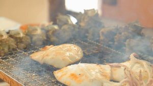 Delicious grilled turban shells and squid made by friendly moms! サザエのつぼ焼き