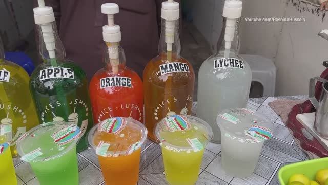 Освежающий безалкогольный напиток уличная еда Карачи. Пакистан