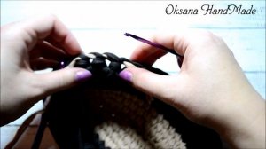 Овальная корзина из трикотажной пряжи.