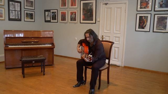 Solo de motivos españoles interpretado por Armando