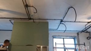 Сделали новую электропроводку в кафе (эл проводка открытая в гофре по потолку).