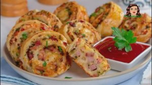 Слоёные рулетики с ветчиной, сыром и чесноком