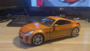 Обзор модели Nissan 350z 2003 в масштабе 1/18 от Welly