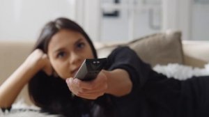 a-girl-using-a-remote-control, young model, young models, model,sexy model, young model fashion