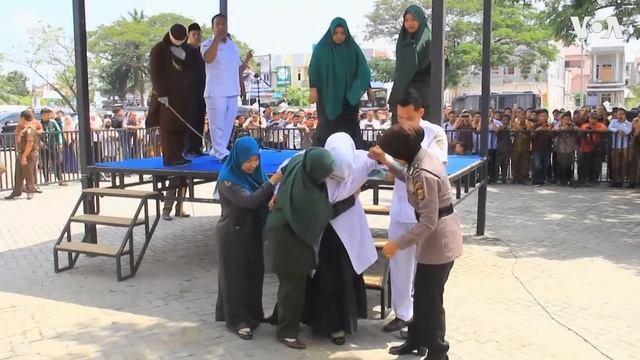 Unmarried Couple Caned in Indonesia