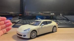 Обзор модели Porsche Panamera S в условном масштабе 1/24 от Welly