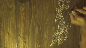 Контурная резьба на сосновом массиве двери. Жар-птица