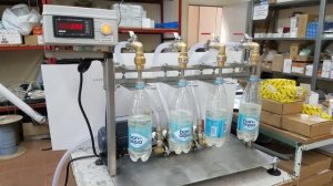 Полуавтомат розлива жидкостей 4х1л.