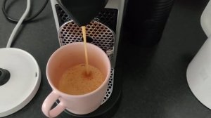 Brewing lungo by Nespresso Citiz coffee machine