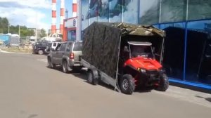 Погрузка багги в бортовой прицеп