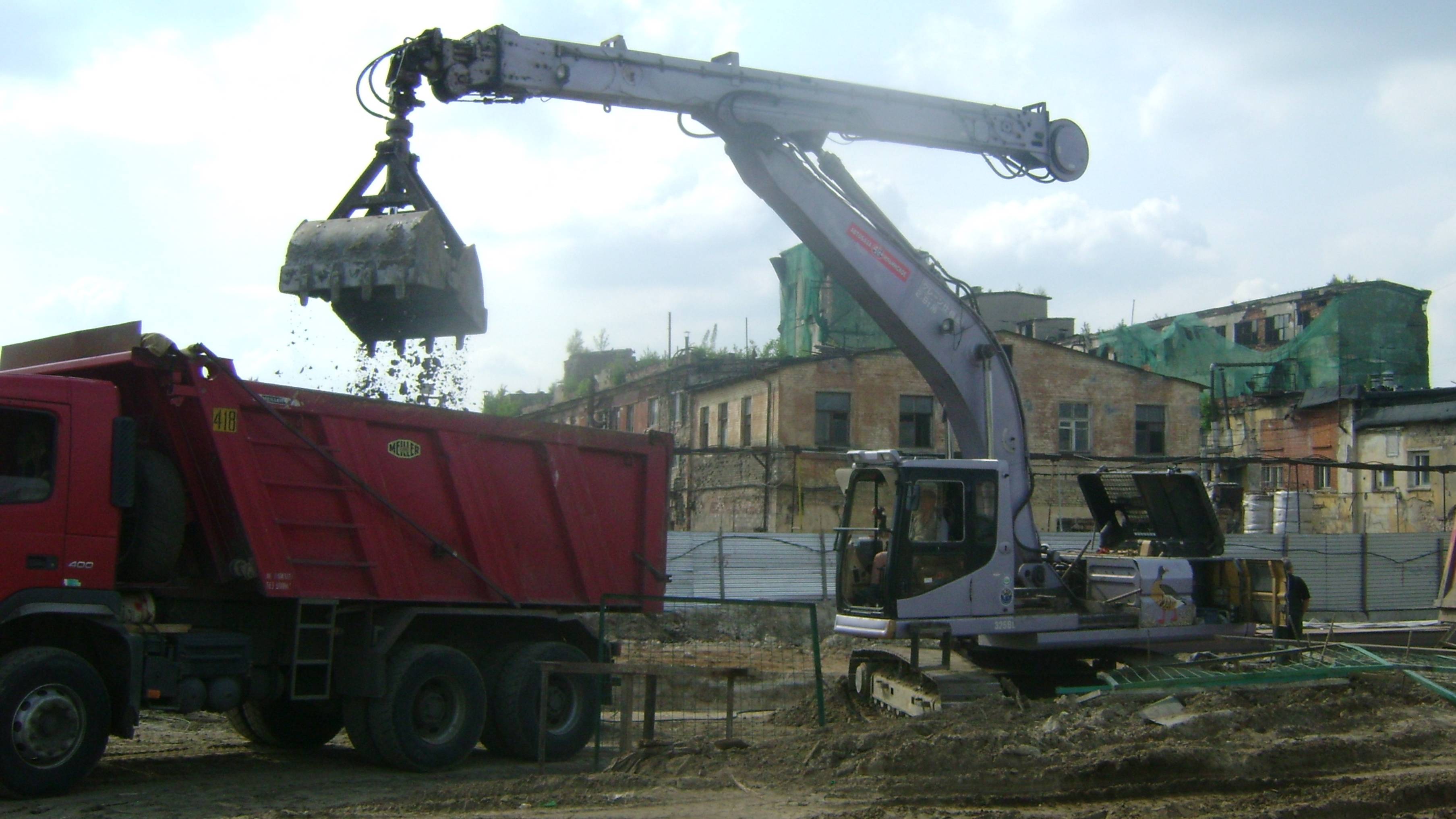 Экскаватор Cat 325B L с телескопической рукоятью смотреть онлайн