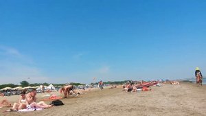 Пляж в Лидо ди Венеция на острове.
