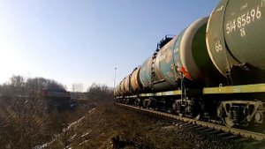 Тепловоз 2ТЭ116-730 "БалтТрансСервис" с грузовым поездом