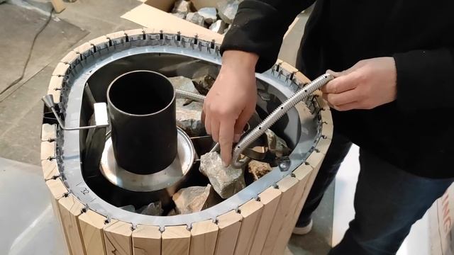 Закрытая каменка Ферингер. Сколько кг камней входит?
