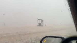 GORILLA HAIL DESTROYS STORM CHASING VEHICLE!