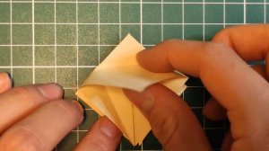 Бумажная кукла в технике оригами