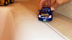 Die cast Metal Scale Model Welly Cars and Maisto sliding into the Water - 4K Video for Kids