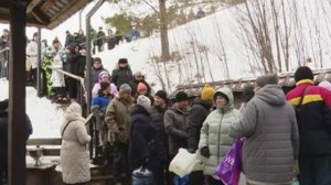 Искупались в купели и набрали святую воду