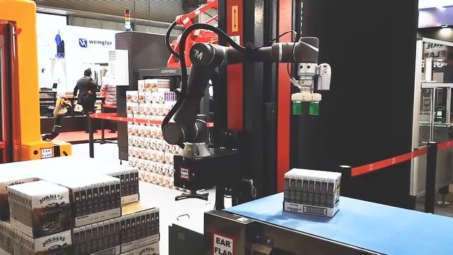 Кобот TECHMAN упаковывает продукцию на поддоны с помощью присосок