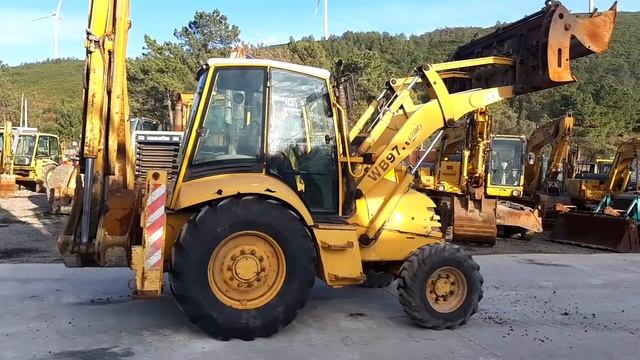 Komatsu WB97R-2, vendida! смотреть онлайн