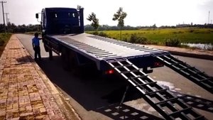 ЭВАКУАТОР КАМАЗ 65117 эвакуаторные лапы TADANO. Перевозка спецтехники до 15тн