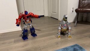 Robosen G1 Optimus Prime Flagship with G1 Grimlock in “Save the Earth” mini theater!