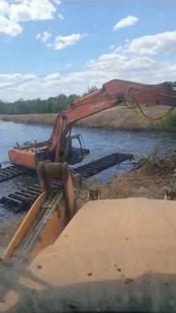 водоплавающий экскаватор