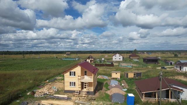 Аэросъемка дома бани 7х7 в полтора этажа с террасой и балконом