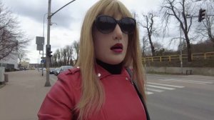 Cute crossdresser is walking in female mask at public.