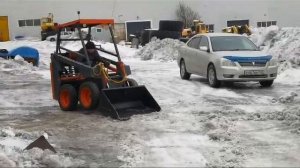 Уборка снега мини погрузчиком