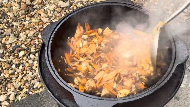 Chicken pilaf with mushrooms in a cauldro. Вкусный плов из курицы с грибами в казане