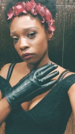 Black Leather Gloves and an Afro