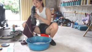 Genius girl repairs and maintains Piaggio 150cc motorbikes.