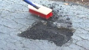 Contractors use U.S. Cold Patch to repair asphalt potholes and cracks