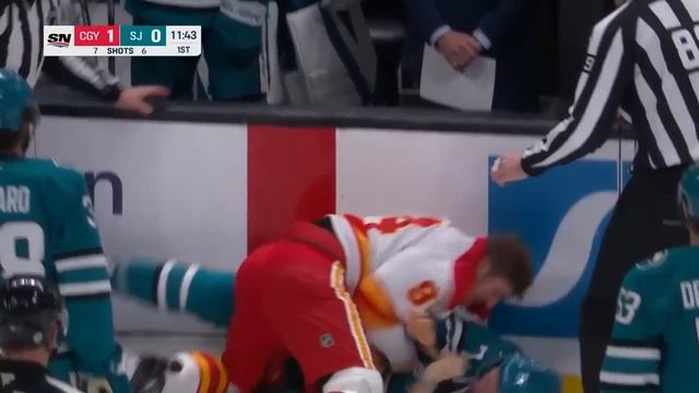 Flames' Brayden Pachal Drops the Gloves After Massive Hit on Sharks' Carl Grundstrom