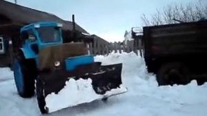 трактор т 40 вытаскивает телегу с дровами