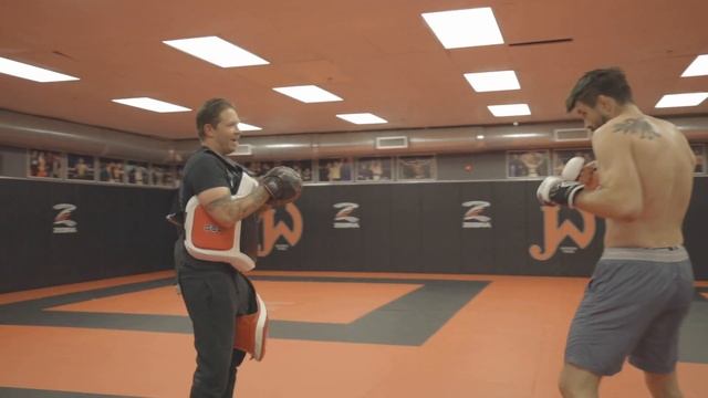 Carlos Condit and Six Gun Gibson killing the mitts