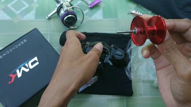 Unboxing reel baitcasting DMK BEACH COMBER, reel untuk casting dan jigging_29