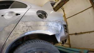 Mitsubishi Lancer X ремонт тяжёлого заднего крыла