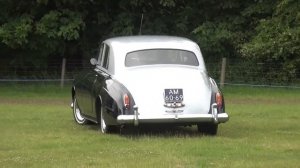 Rolls-Royce Silver Cloud driving in the English fields