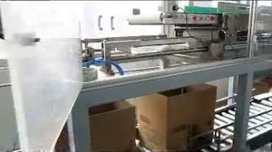 Автоматическая укладка пакетов с продуктом в картонные короба