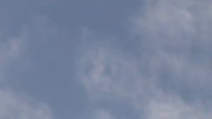 Мариуполь . изображение лица на фоне голубого неба 11.10.16...