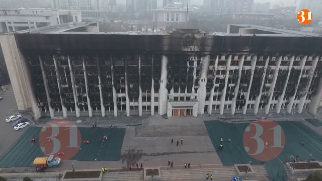 Бүліктен кейінгі Алматы (Дронмен түсірілген). Площадь Республики после погромов. Вид сверху.