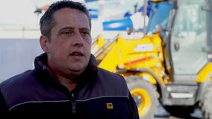 JCB 3CX Compact at work with Holiday Resort Unity